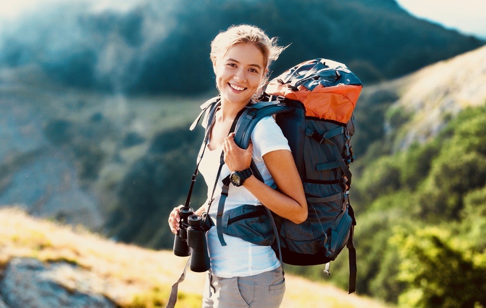 girl walking in the mountains 